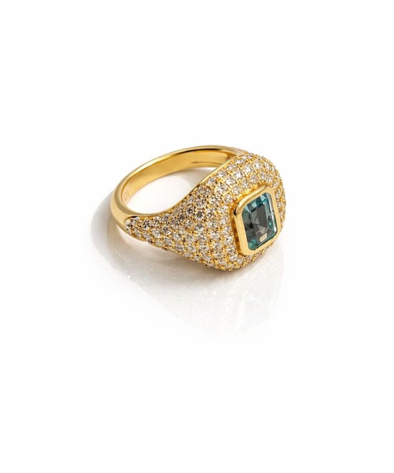 Anel Ovalado Cravejado Moissanite com Água-marinha Central 5 mm