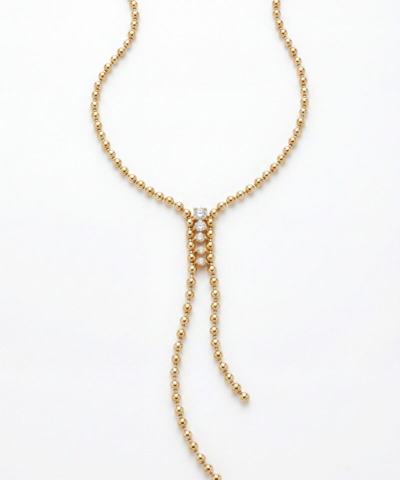 Colar gravata dourado em banho de ouro 18K com esferas e pedra central de 3,5 mm, duas extensões frontais